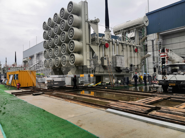 Synchronous Pushing and Positioning of Transformers