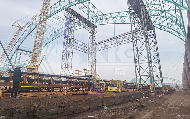Application of clamp-on synchronous lifting hydraulic system in the project of lifting raw material warehouse shed in steel mill