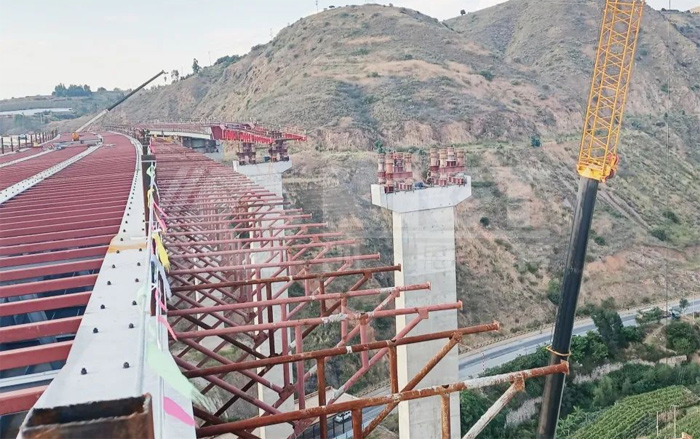 The highway bridge spans both sides of the canyon.