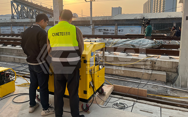 Synchronous Lifting System for Post-Settlement Lifting Tests of Railway Bridge Transition Sections