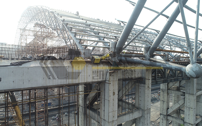 Synchronized Rail-Clamp Hydraulic Pushing System for Steel Structure Roof Installation in Steel Plant Coal Storage Yards