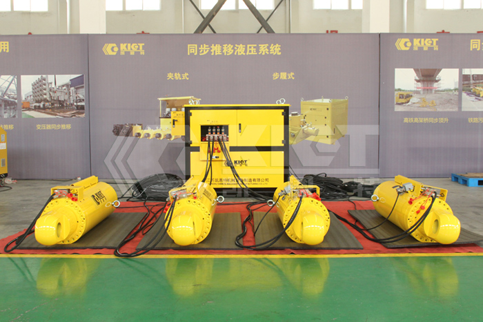 Four-point synchronous lifting load positioning system configuration scheme